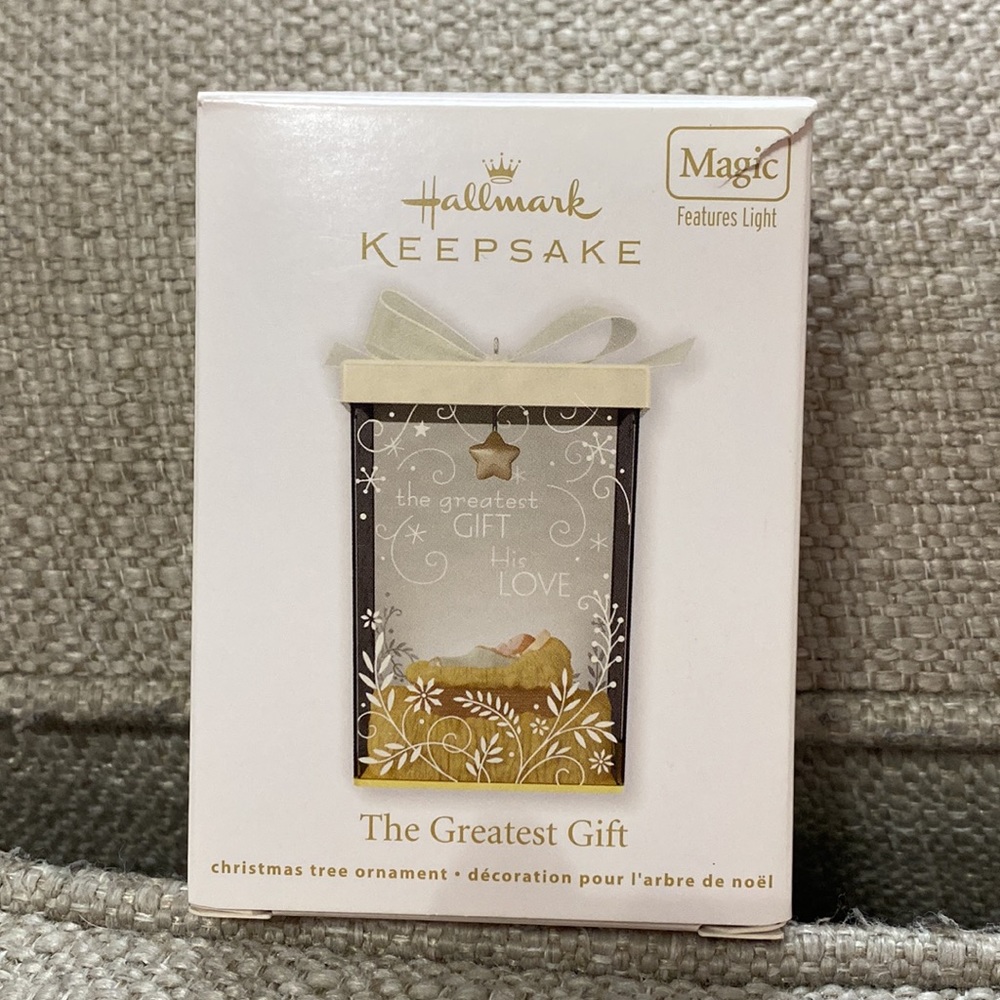2012 Hallmark keepsake ornament. “The Greatest Gift” Magic (features light).